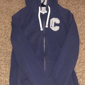 Champion jacket , Has hoodie and pockets